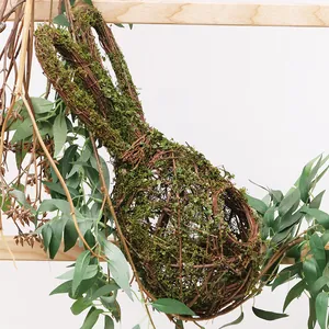 Handcrafted rabbit-shaped vine bird's nest wall hanging with moss for Easter decor