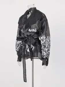 Elegant black sheer puff sleeve shirt with white floral print and adjustable waist tie belt