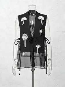 Gilet noir tendance avec fleurs à paillettes 3D et empiècements en mesh transparent