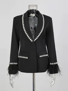 Elegant black slim fit blazer for women featuring luxury rhinestone trim and feather cuffs