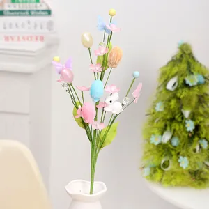 Easter decoration branch with cute white rabbit and colorful pastel eggs for DIY bouquets