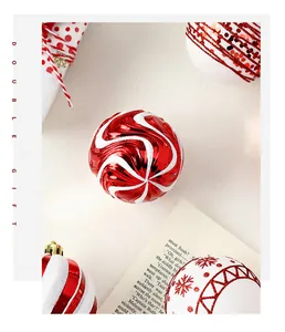 Close-up of festive red and white Christmas baubles with intricate patterns