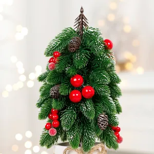Mini tabletop artificial Noble fir Christmas tree with red berries and pinecones