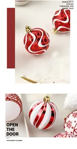Macro detail of red and white painted Christmas ball ornaments with festive patterns