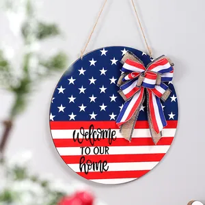 Patriotic Independence Day wooden door sign with US flag design and ribbon bow