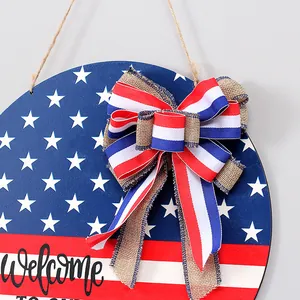 Wooden Independence Day door sign with American flag pattern and decorative bow