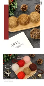 Close-up of assorted colorful wool-wrapped Christmas ball ornaments on wooden tray
