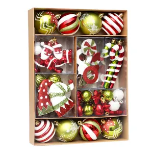Comprehensive 50pcs set of red and green painted Christmas tree hanging ornaments in box.