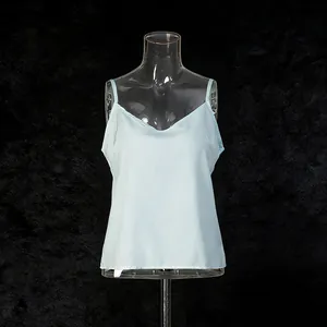Detailed front view of a light blue satin camisole with thin spaghetti straps and V-neck