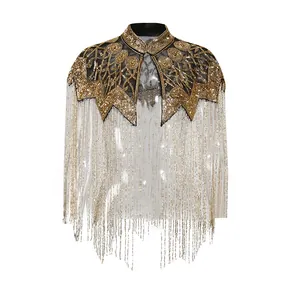 Detail van Franse stijl cape met gouden kralenwerk en elegante lange zijden franjes.