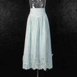 Close-up detail of vintage romantic high waist A-line midi skirt with intricate lace trim