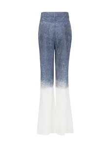 Pantalon évasé dégradé à taille haute, texture denim et ourlet en mesh blanc