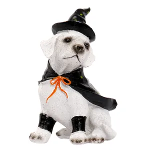 Adorable Halloween Labrador puppy figurine wearing a black witch hat and cape resin ornament
