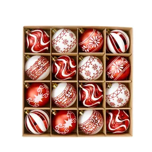 Set of 16 red and white painted Christmas baubles in a gift box for holiday tree decoration