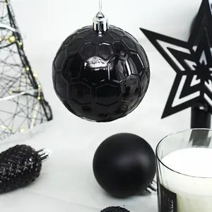 Elegante set de bolas de Navidad negras con textura de panal y adorno de estrella