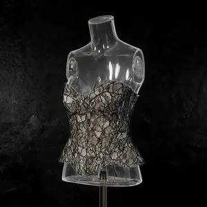 Detailansicht eines eleganten schwarzen Spitzen-Bustiers auf einer klaren Torso-Puppe