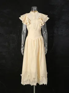Elegant vintage beige two-piece set featuring ruffled sleeve top and lace midi skirt