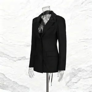 Elegant black slim-fit blazer for women featuring a delicate lace collar detail