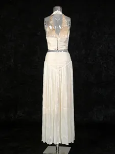 Elegant French style 2-piece set featuring halter sleeveless top and pleated maxi skirt