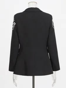 Elegant black women's blazer featuring heavy beadwork and rhinestone shoulder designs.
