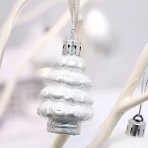 White Christmas tree shaped ornament with snow texture for festive decoration