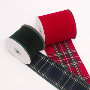 Close-up of red and green velvet ribbons with festive plaid patterns for gift wrapping