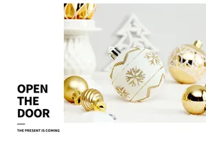 Close-up of gold and white Christmas ornaments with festive snowflake and line patterns