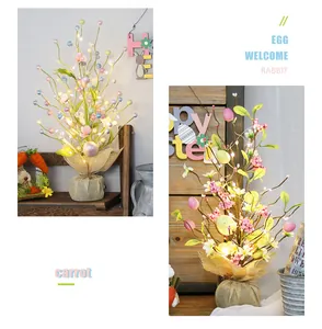 Detailed view of LED lighted Easter egg tree with warm fairy lights and burlap base