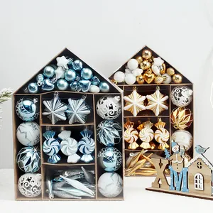 Festive Christmas ball ornament set in house-shaped gift packaging for tree decoration