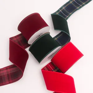 Detailed view of luxury velvet ribbons with plaid backing for Christmas gift wrapping