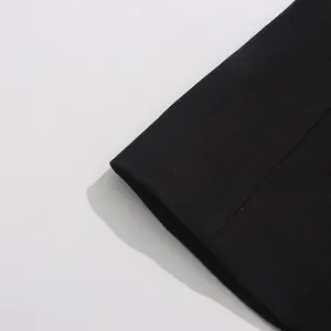 Detailed close-up showing the premium black twill fabric texture on a slim fit blazer jacket