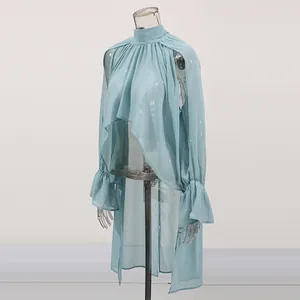 Close-up detail of light blue high-neck irregular hem chiffon blouse on mannequin.