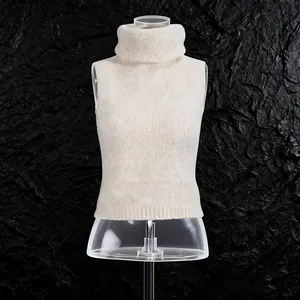 Detailed view of an off-white knitted turtleneck sleeveless sweater vest on a mannequin.
