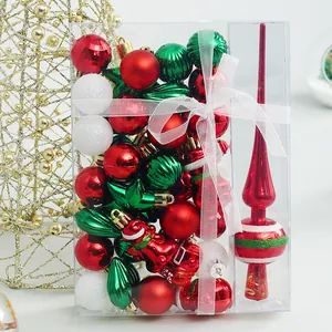 Set of 34 red and green Christmas ornaments in a clear gift box with a white ribbon bow.