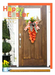 Vibrant Easter carrot wreath made of orange tulips hanging on a wooden front door