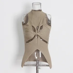 Detailed front view of the stylish twist-knot hollow design on khaki knitted vest.