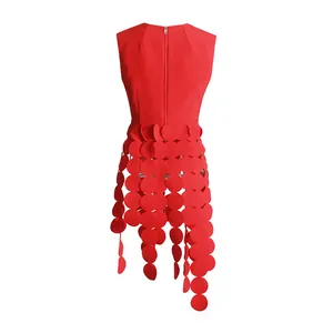 Detailed back view of red sleeveless top featuring a unique patchwork circle fringe design