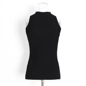 Detailed view of a black mock neck sleeveless ribbed knit tank top shown on a mannequin