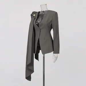Detailed side view of dark grey slim fit blazer with unique shoulder drape