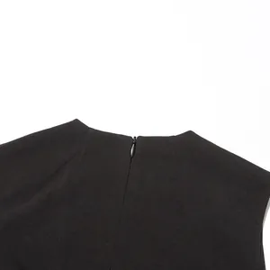 Detail shot showing the back neckline and hidden zipper of a black sleeveless top vest