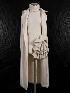 Elegant 3-piece knit set featuring long coat, turtleneck sweater, and 3D ruffle skirt