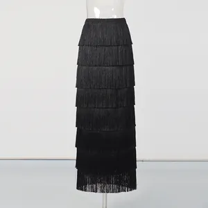 Detailed view of the layered black fringe design on this elegant high-waisted maxi skirt.