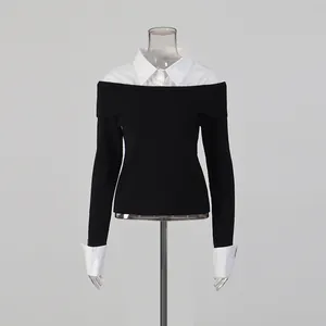Front view of elegant fake two-piece long sleeve top combining black knit and white shirt