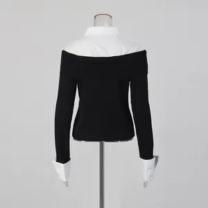 Back view of a faux two-piece knit top with white shirt collar and contrast cuffs