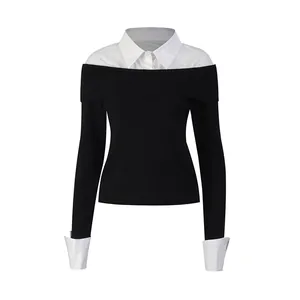 Elegant black faux two-piece knit top featuring a white shirt collar and contrast cuffs