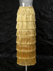 Elegant gold multi-layered fringe maxi skirt featuring a high waist for stylish party wear