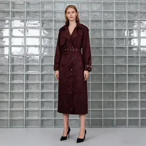 Elegant burgundy faux suede long trench coat with belt for autumn office wear.