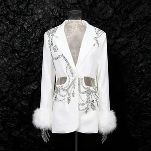 Elegant white luxury rhinestone blazer featuring cutout waist details and faux fur cuffs