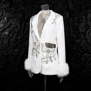 Luxury white blazer with rhinestone embroidery, waist cutouts, and faux fur cuffs detail