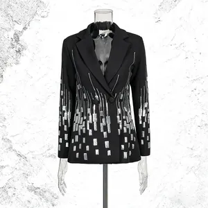 Elegant black blazer featuring silver sequins, long sleeves, and a classic lapel collar.